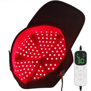 Red light therapy cap showing its LED-lined interior and controller